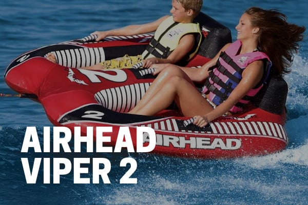 kids and adults riding on an airhead viper 2 towable tube